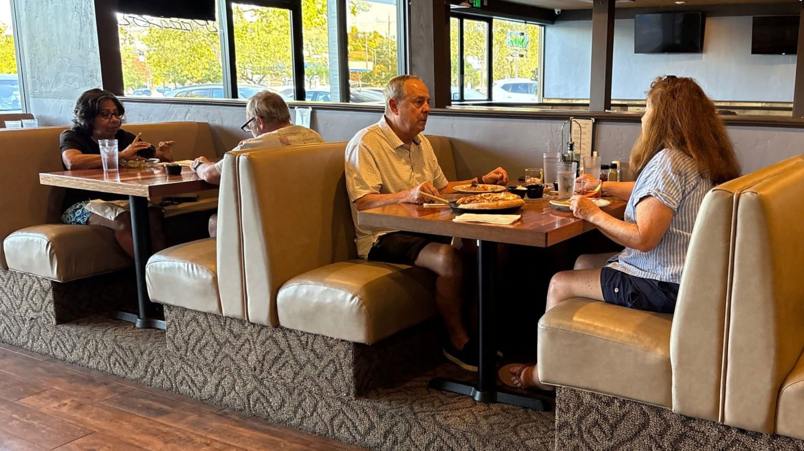 Guests dining in DeVino's booth seating